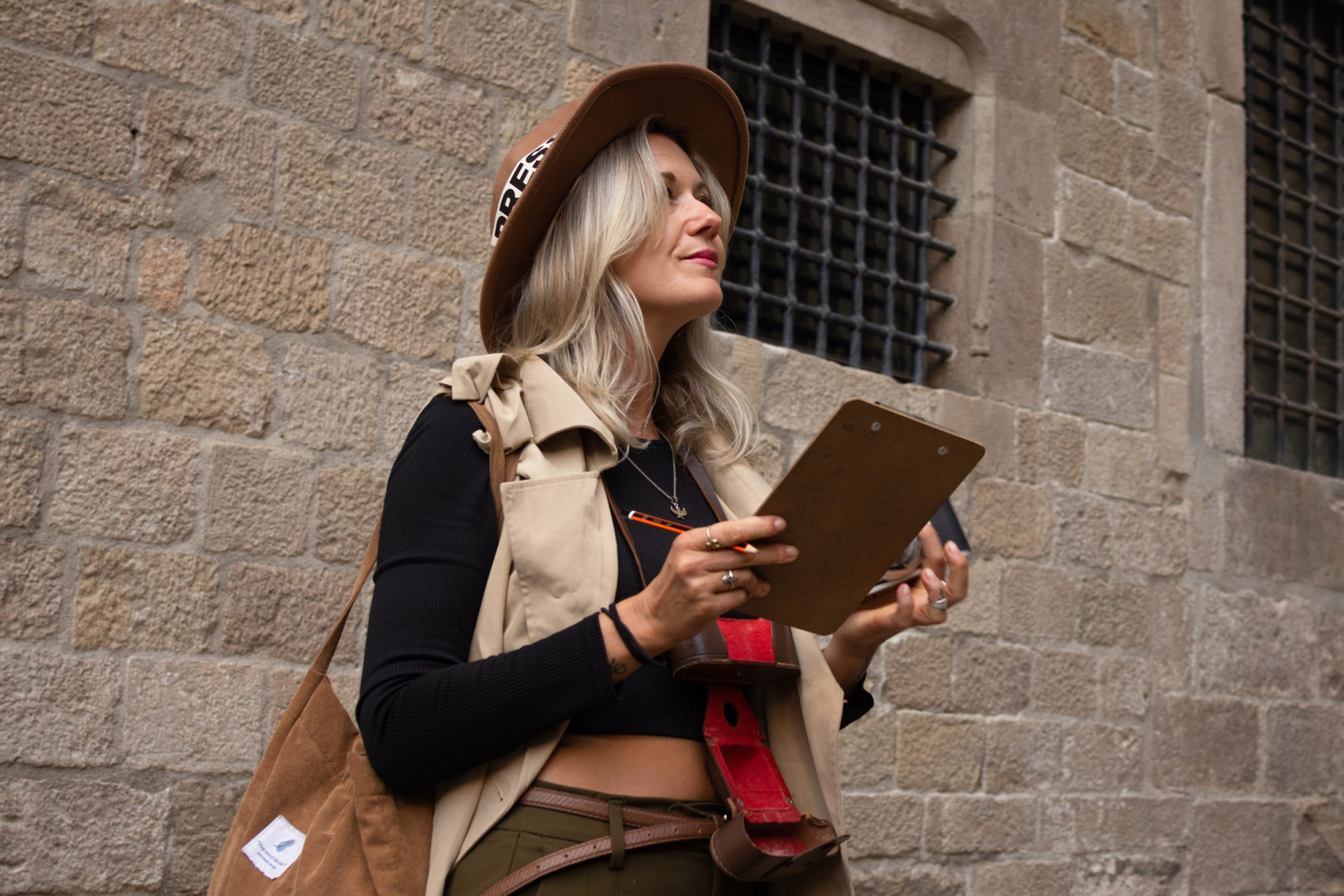 Female journalist during immersive city escape game The Secret Spy Network in Barcelona